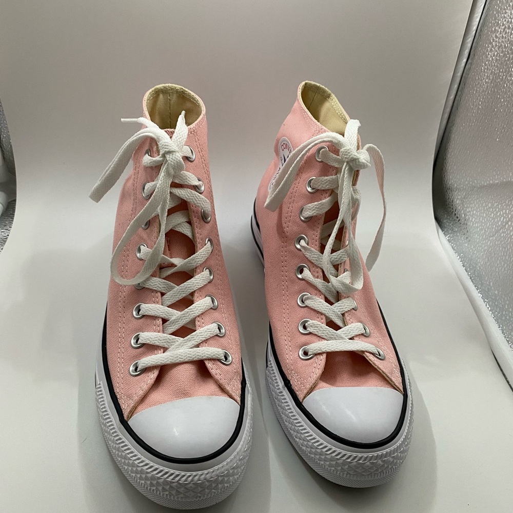 Converse Chuck Taylor Light Pink High Tops.